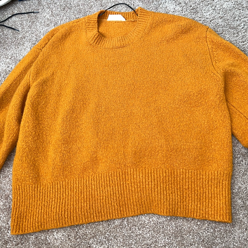 Orange knitted sweater
